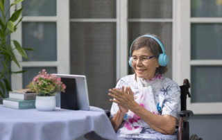 Music therapy in dementia treatment on elderly woman.